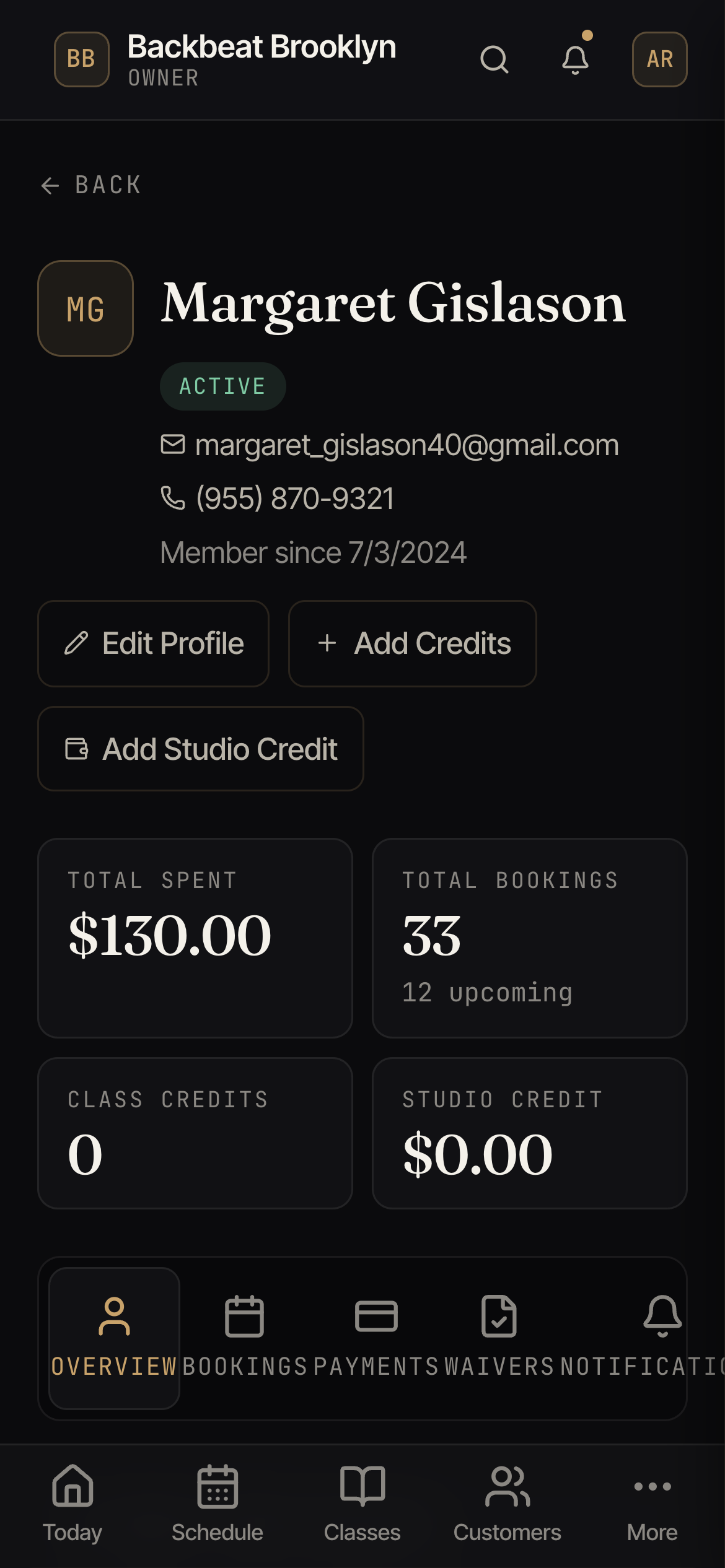 A customer profile showing total spent, bookings, active subscriptions, contact info, and staff notes.