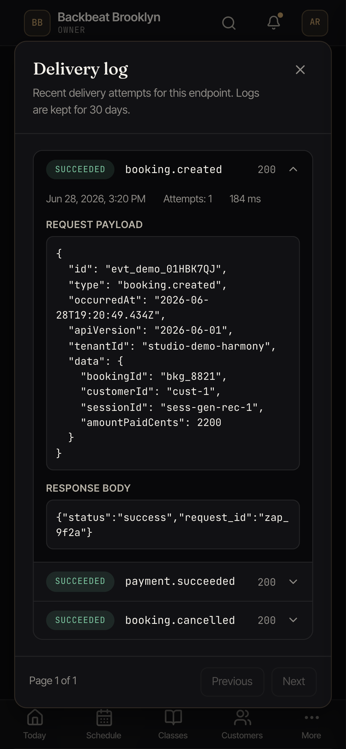 The delivery log window listing recent webhook attempts with event, status, response code, time, and attempt count, and a row expanded to show the request and response.